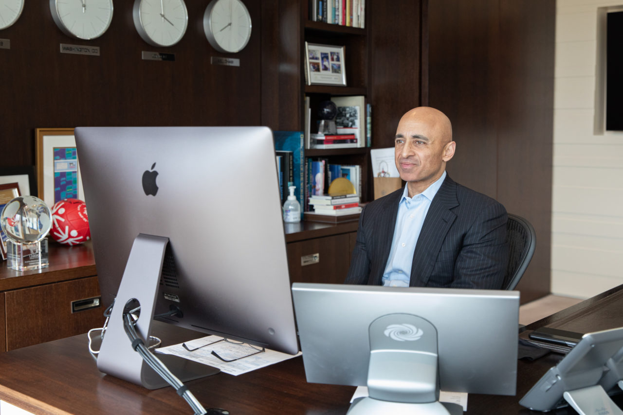 Ambassador Yousef Al Otaiba works on a computer at his Embassy desk