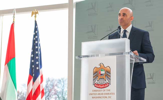 Ambassador Al Otaiba speaks from a podium at the UAE Embassy in Washington, D.C.