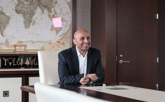 Yousef Al Otaiba sitting at a conference table