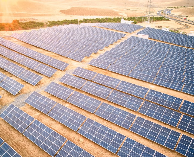 A picture of solar panels at a solar plant.