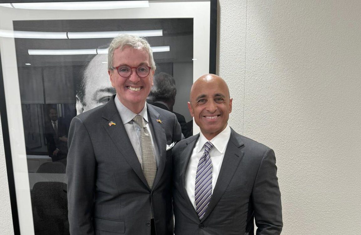 Phil Murphy, Governor of New Jersey, stands with Yousef Al Otaiba, Emirati Ambassador to the U.S.