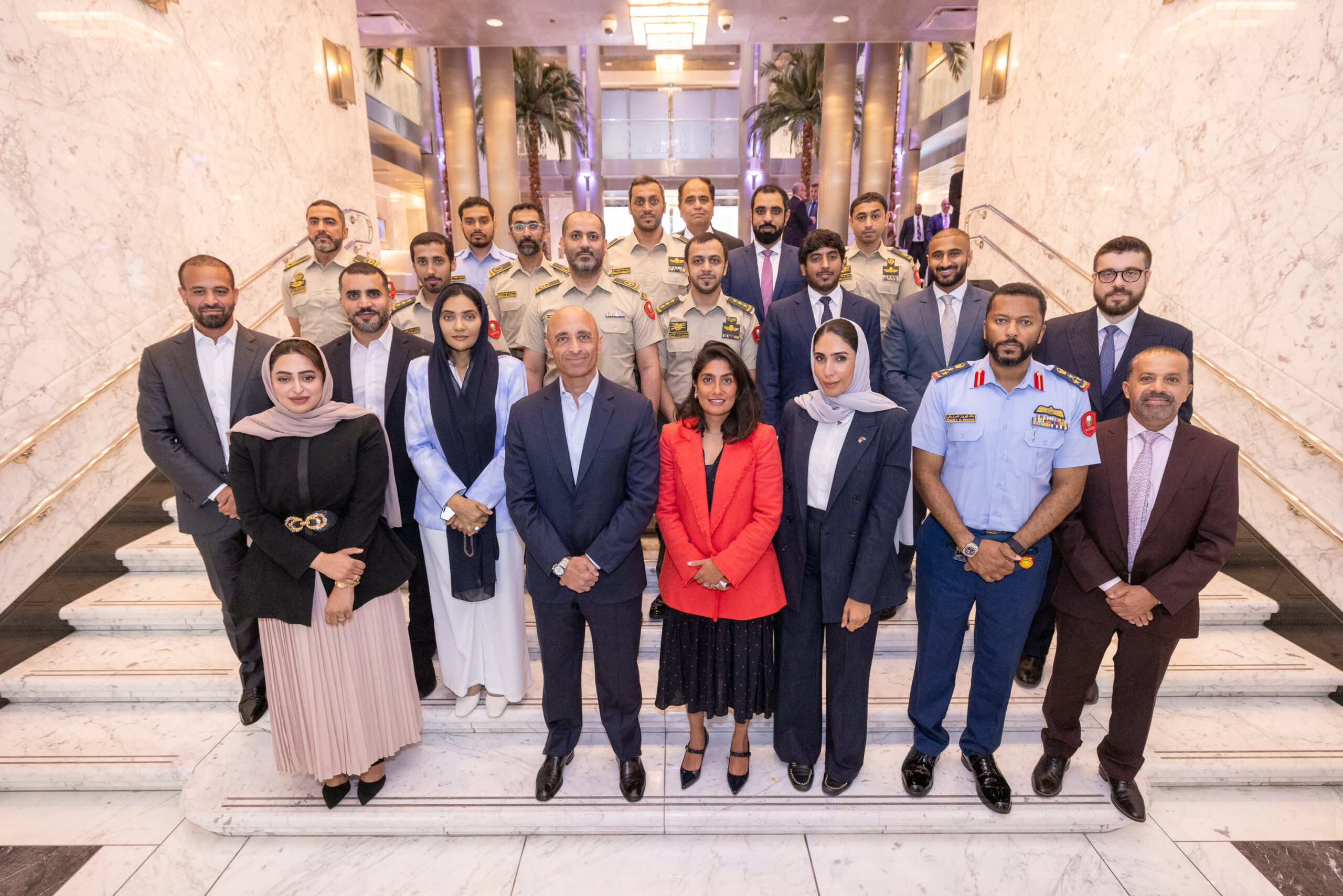 Yousef Al Otaiba and other members of staff at the UAE Embassy pose for a picture.